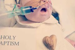 Parents fight legal battle to stop hospital from removing 7-month-old baby from life support