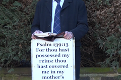 Christian preacher facing prison over Bible sign near abortion clinic