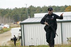 Aircraft, divers search river during manhunt for Maine mass shooting suspect