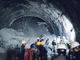 Rescuers dig for workers trapped in collapsed tunnel in India
