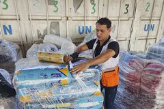 Downed communication system halts aid deliveries to Gaza