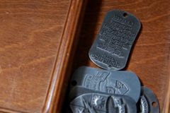 Texas business sues US military over ban on sale of Bible-themed dog tags