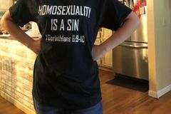 Student sent home for wearing 'homosexuality is a sin' shirt gets payment from school district