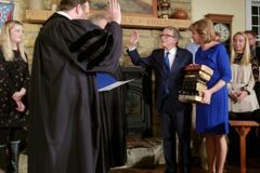 Ohio's new Gov. Mike DeWine swears on 9 Bibles during oath-of-office ceremony