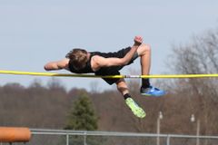 Male athlete takes first place in girls' high jump championship meet