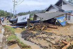 Landslides, floods kill at least 26 people in Indonesia