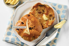 Christians debate hot cross bun with tick