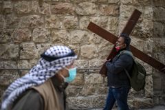 In Jerusalem, Palestinian Christians Observe Scaled-Down Good Friday Celebrations