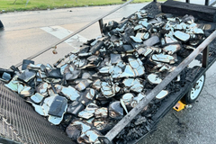 Large pile of burnt Bibles left outside church on Easter Sunday
