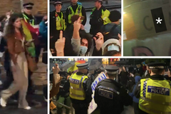 Police protect young female pro-life speaker from screaming pro-abortion mob in Manchester