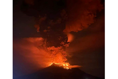 Indonesia evacuates residents near erupting volcano