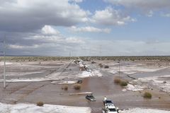 New Mexico continues battling flames amid flash floods