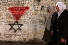 Berlin bans Hamas red triangle used to target Jews, supporters of Israel