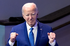 Biden tells Democratic lawmakers he will stay in the race