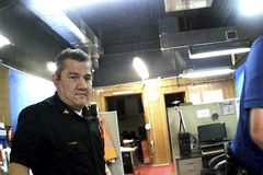 Former police chief charged with obstruction after newsroom raid