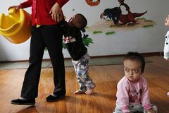 China halts most international adoptions