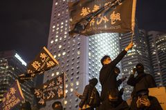 Hong Kong jails two in first sentences for violating new security law