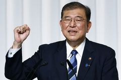 Former Japanese defense minister named head of majority party