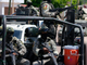 Mexican army kills 19, arrests cartel leader