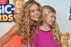 Charlie Sheen, Denise Richards’ daughter gets baptized, says Jesus saved her from depression: 'He gave me light'