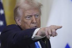 Trump again pulls out of UN rights council, cuts relief funding