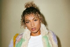 DaniLeigh Gets Baptized, Marking a Major Shift in Her Faith Journey - RELEVANT