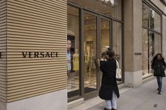 Prada to buy rival Versace for $1.38 billion