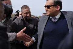 Ex-U.S. Rep. Santos to serve over seven years in prison