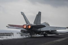 $60M jet slid off carrier into Red Sea, Navy says