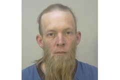 Wisconsin police criminally charge father of Christian school shooter