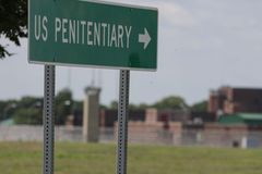 One of a dozen inmates drops claim in lawsuit against Trump transgender prison policy