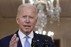 With Americans still in Afghanistan, Biden claims success