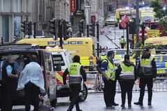 Police in Liverpool rule out terrorism after car rams into crowd at parade