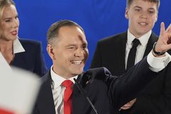 Catholic historian ekes out presidential win in Poland