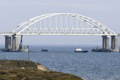 Underwater explosives hit Russia’s bridge to Crimea