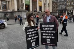 Belgian police arrest, strip search Billboard Chris, ADF staffer for holding signs defending kids