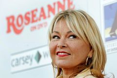Roseanne Barr blames God for career-ending tweet about Obama advisor Valerie Jarrett