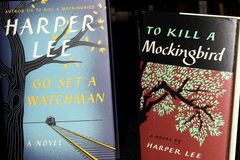 School board votes against teacher who read book with racial slur