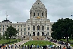 Assassinated Minnesota politician lies in state as suspect appears in court