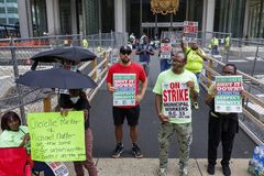 Judge orders 911 operators back to work as thousands strike in Philadelphia