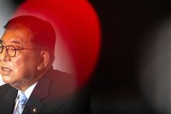 Japanese PM stays for trade negotiations after election loss