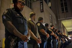 Gunman who killed four planned to hit NFL office, mayor says