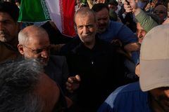 Iranian-Americans who return risk lockup there, U.S. warns