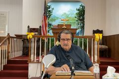 Pastor who lost wife, daughter in Kentucky church shooting makes defiant return