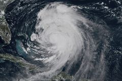 Hurricane Erin’s storm surge begins to impact North Carolina’s Outer Banks