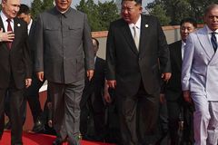 Putin, Kim Jong Un attend Chinese parade of weapons