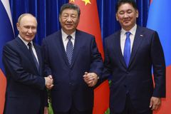 Xi, Putin, Mongolian leader sign agreements in China