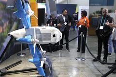 Feds investigate crash of Amazon drones, construction crane