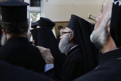 Washington court blocks confession law after priests sue