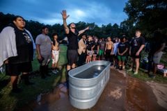 Faith on the field: 11 NC high school football players baptized after recent practice | Baptist Press